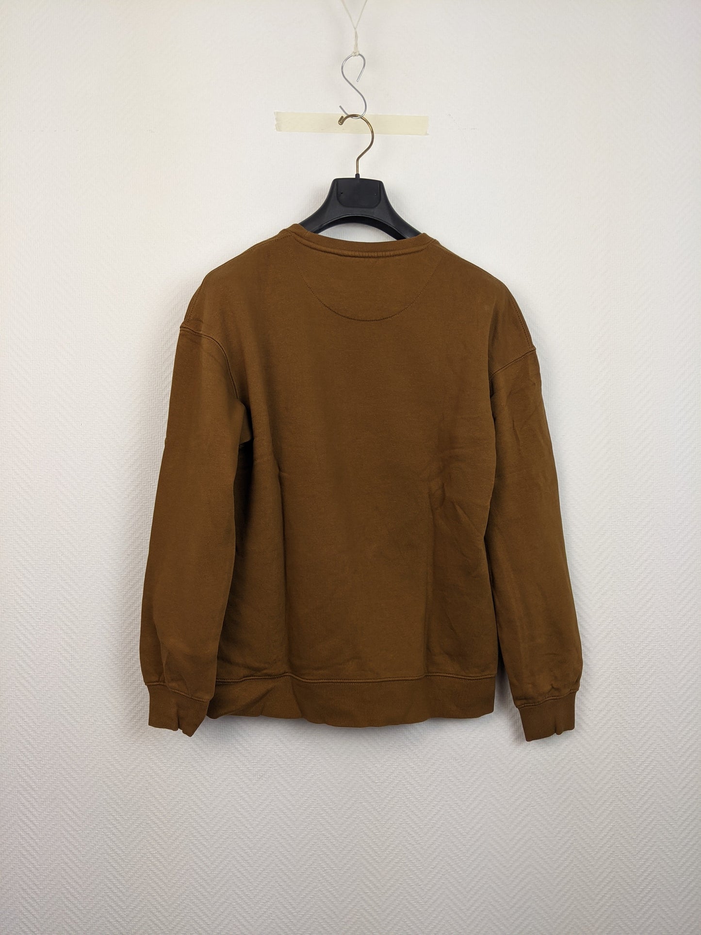 Back view of brown sweatshirt