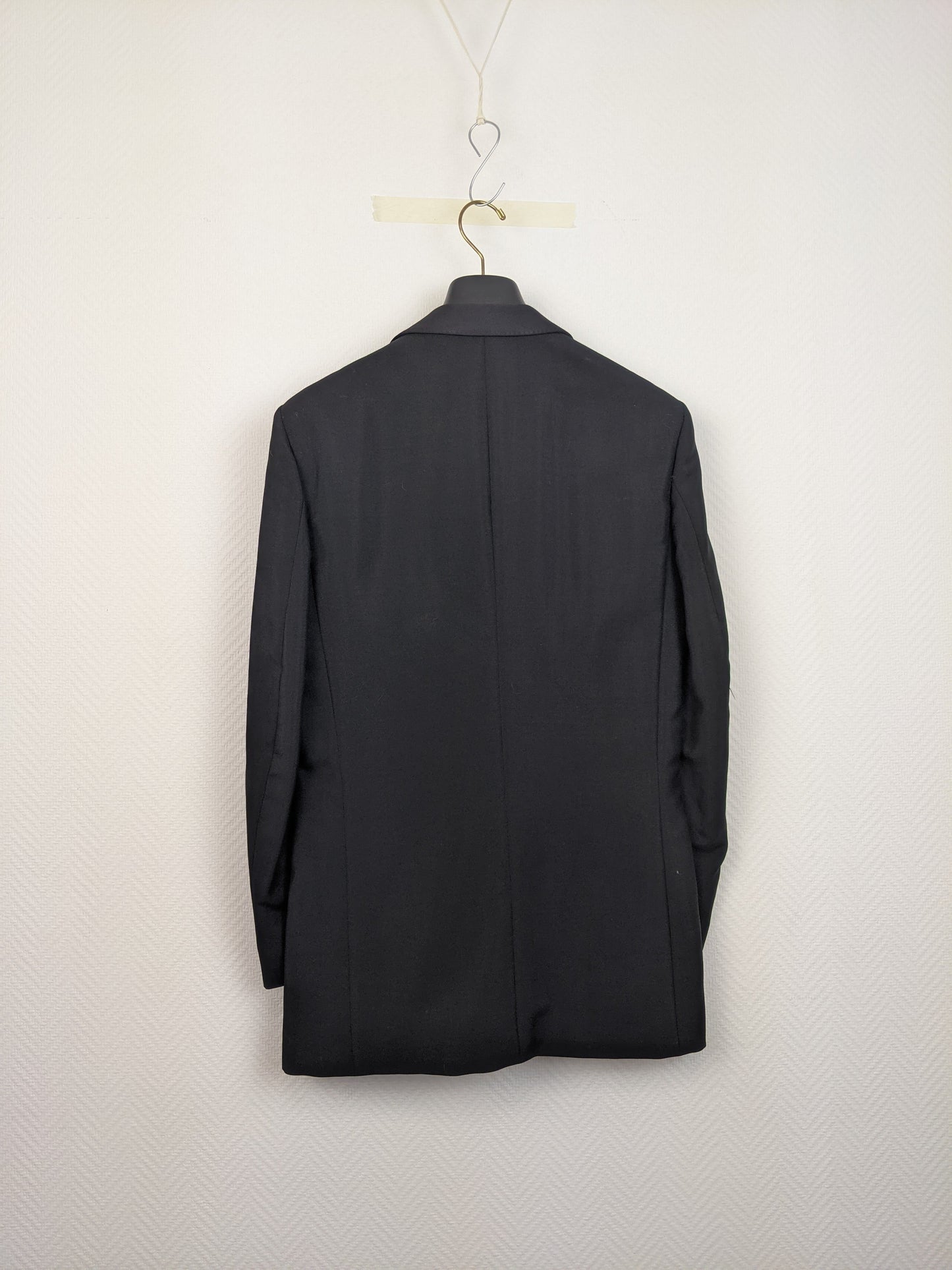Back view of black tuxedo jacket