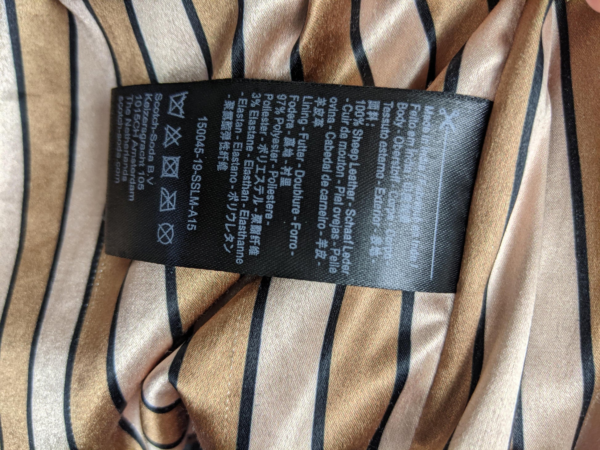 Care tag of Scotch & Soda black leather biker jacket