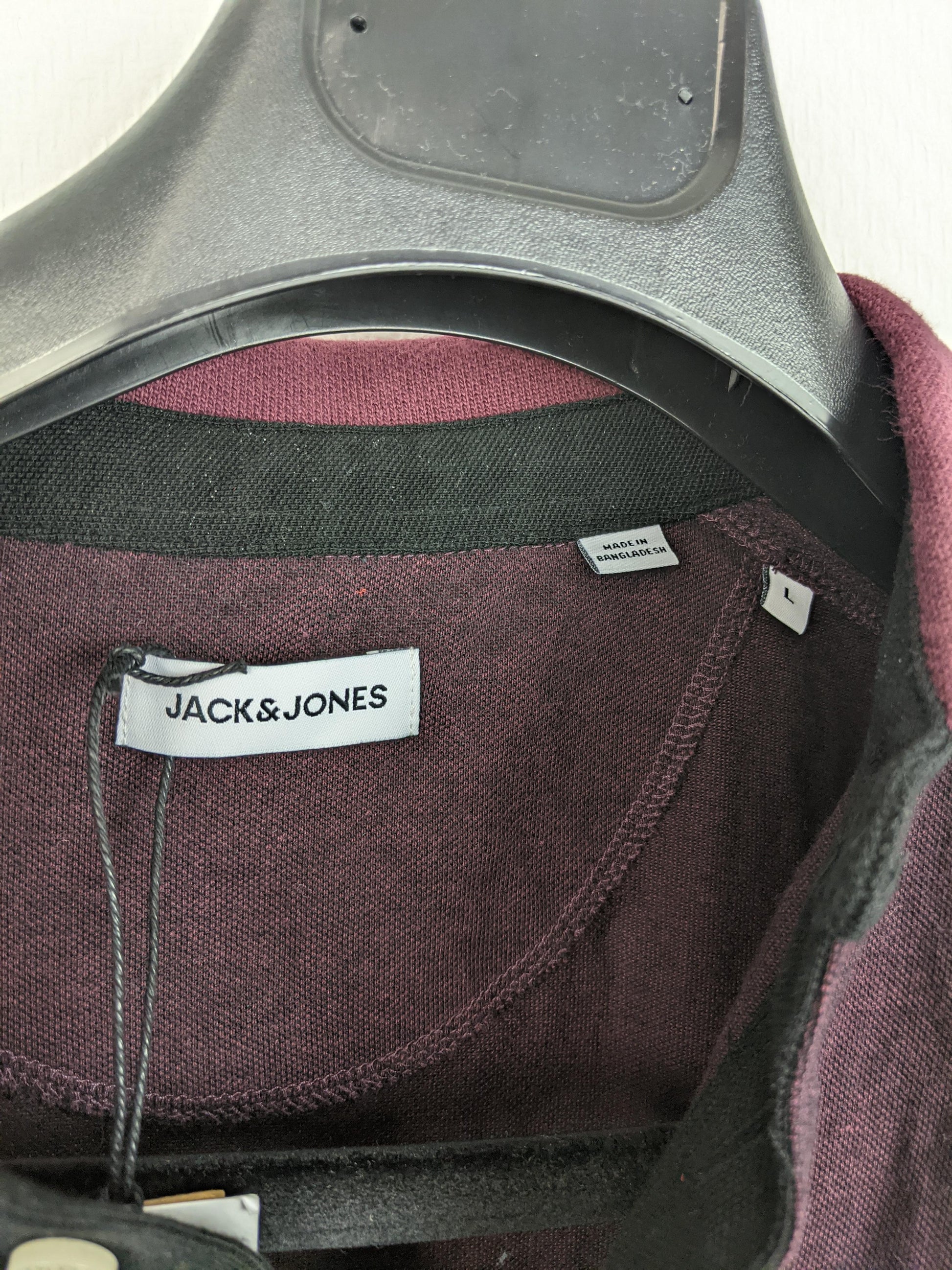 Close-up of Jack & Jones label and size tag