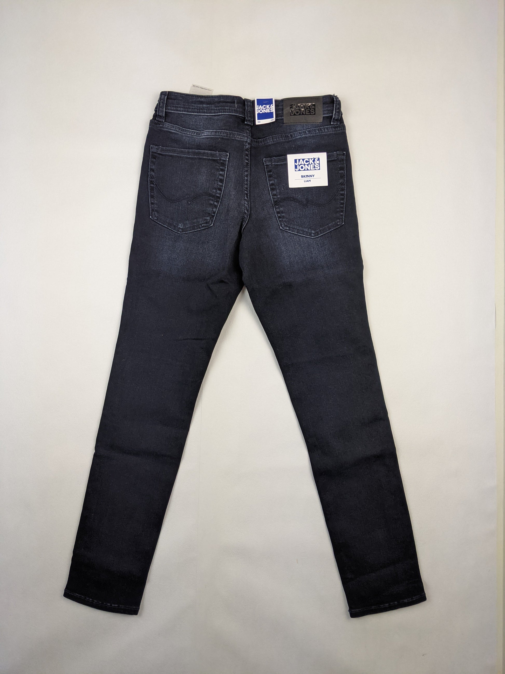 Back view of black skinny jeans