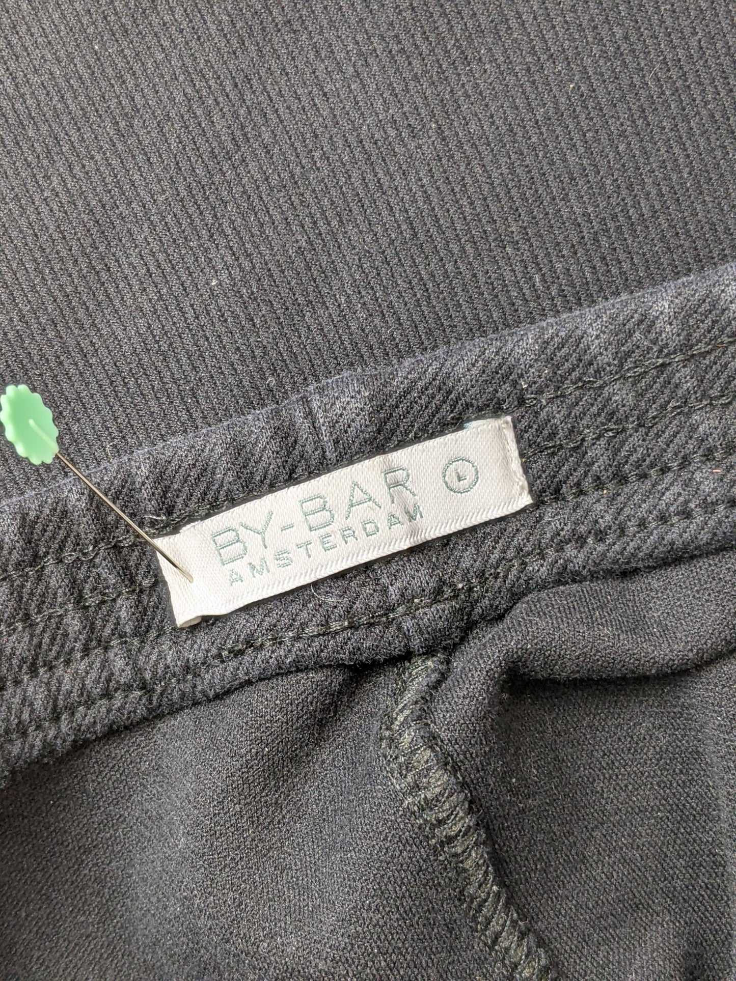 Brand label of BY-BAR Amsterdam jogger pants