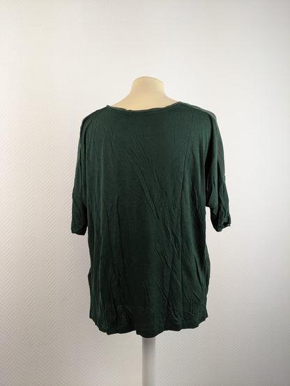 Back view of dark green blouse
