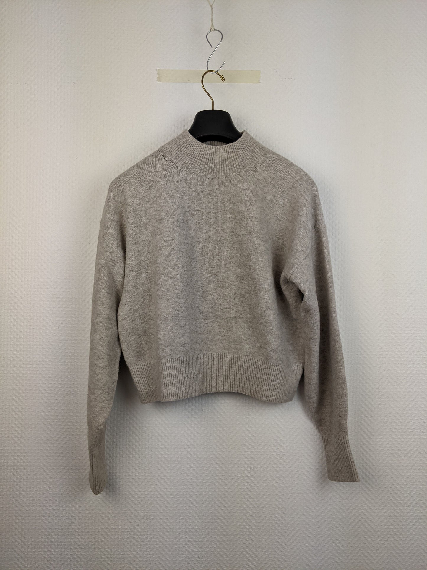 Front view of grey wool sweater