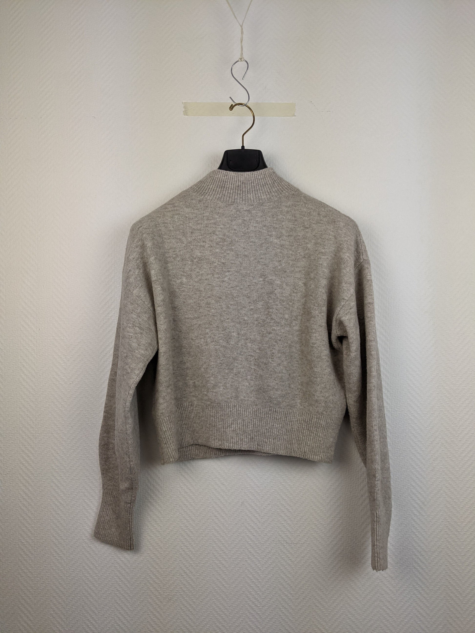 Back view of grey wool sweater
