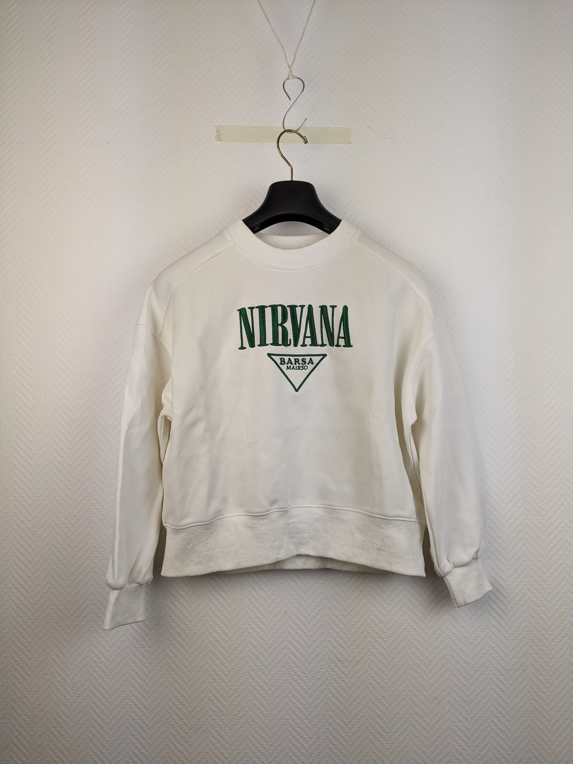 Front view of white Nirvana sweatshirt