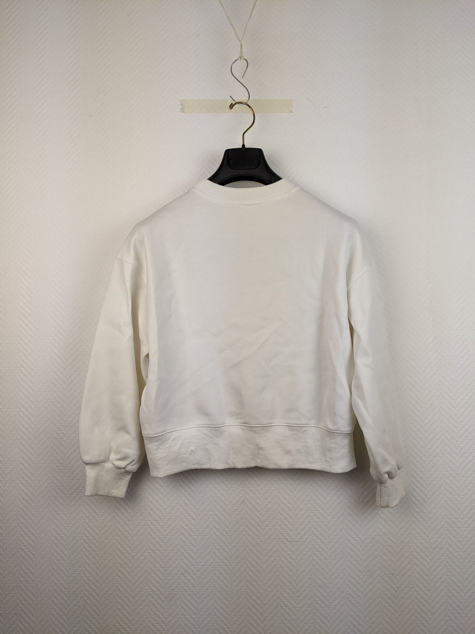 Back view of white Nirvana sweatshirt