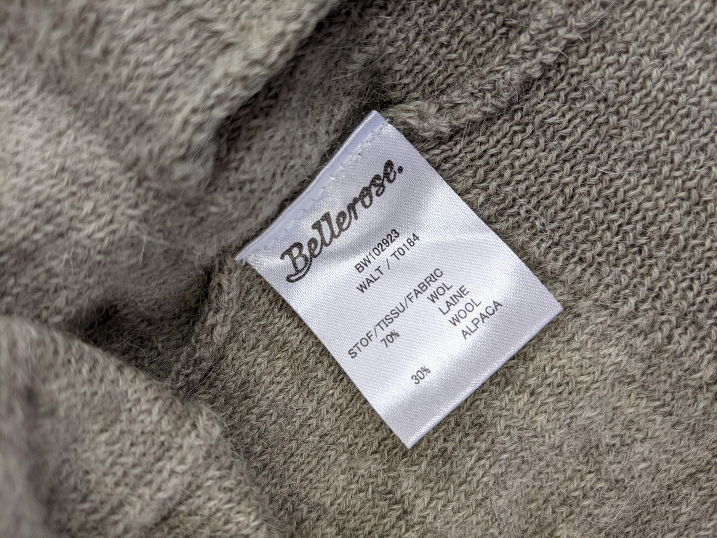 Fabric tag on Bellerose cardigan indicating wool and alpaca blend