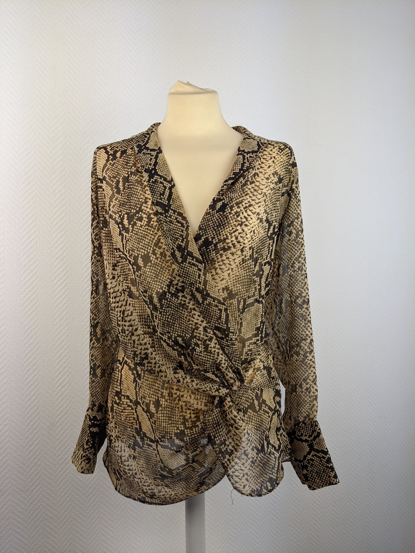Front view of snake print blouse
