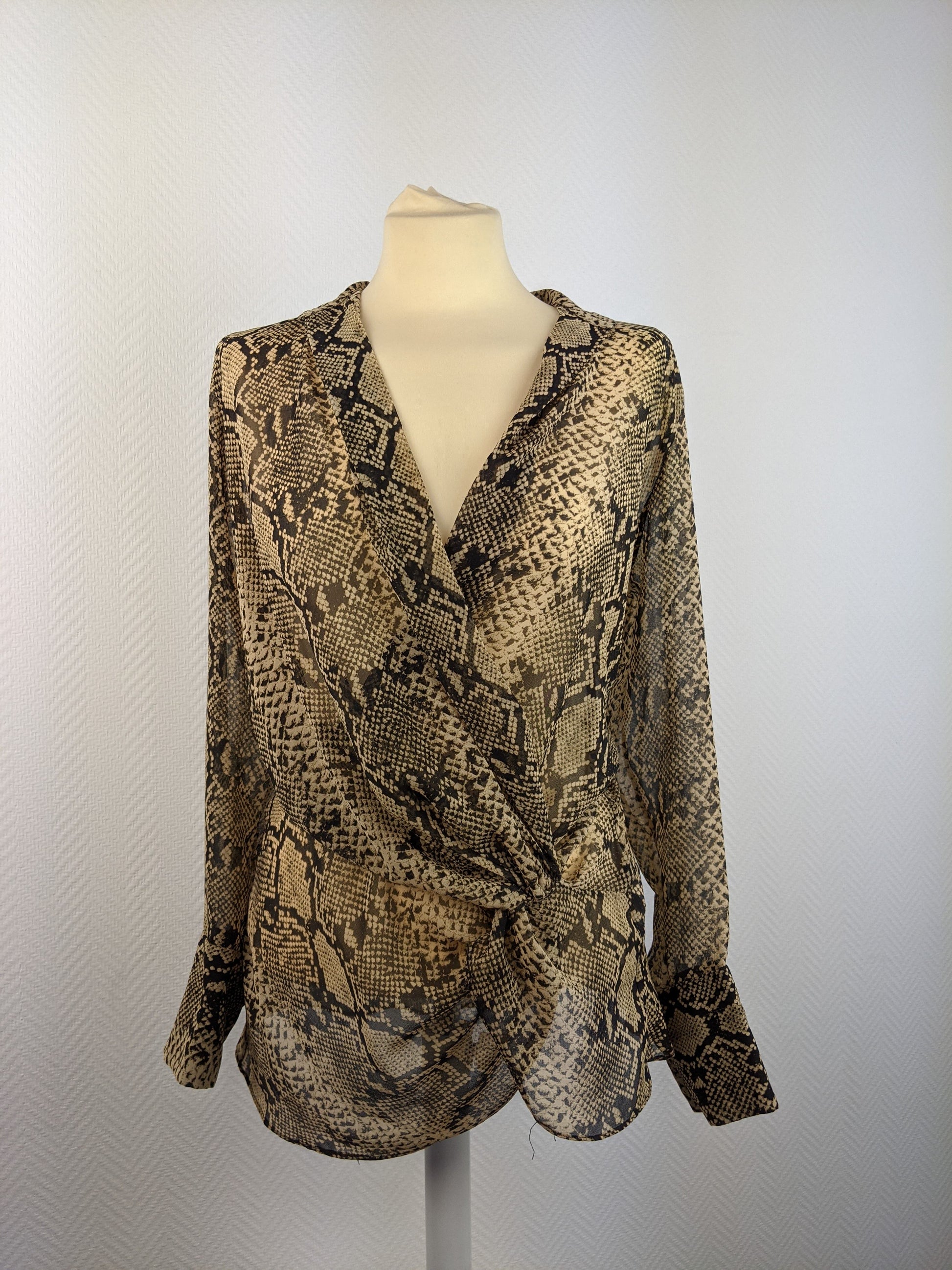 Front view of snake print blouse