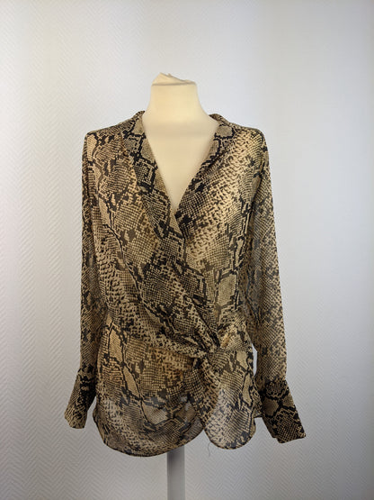 Front view of snake print blouse