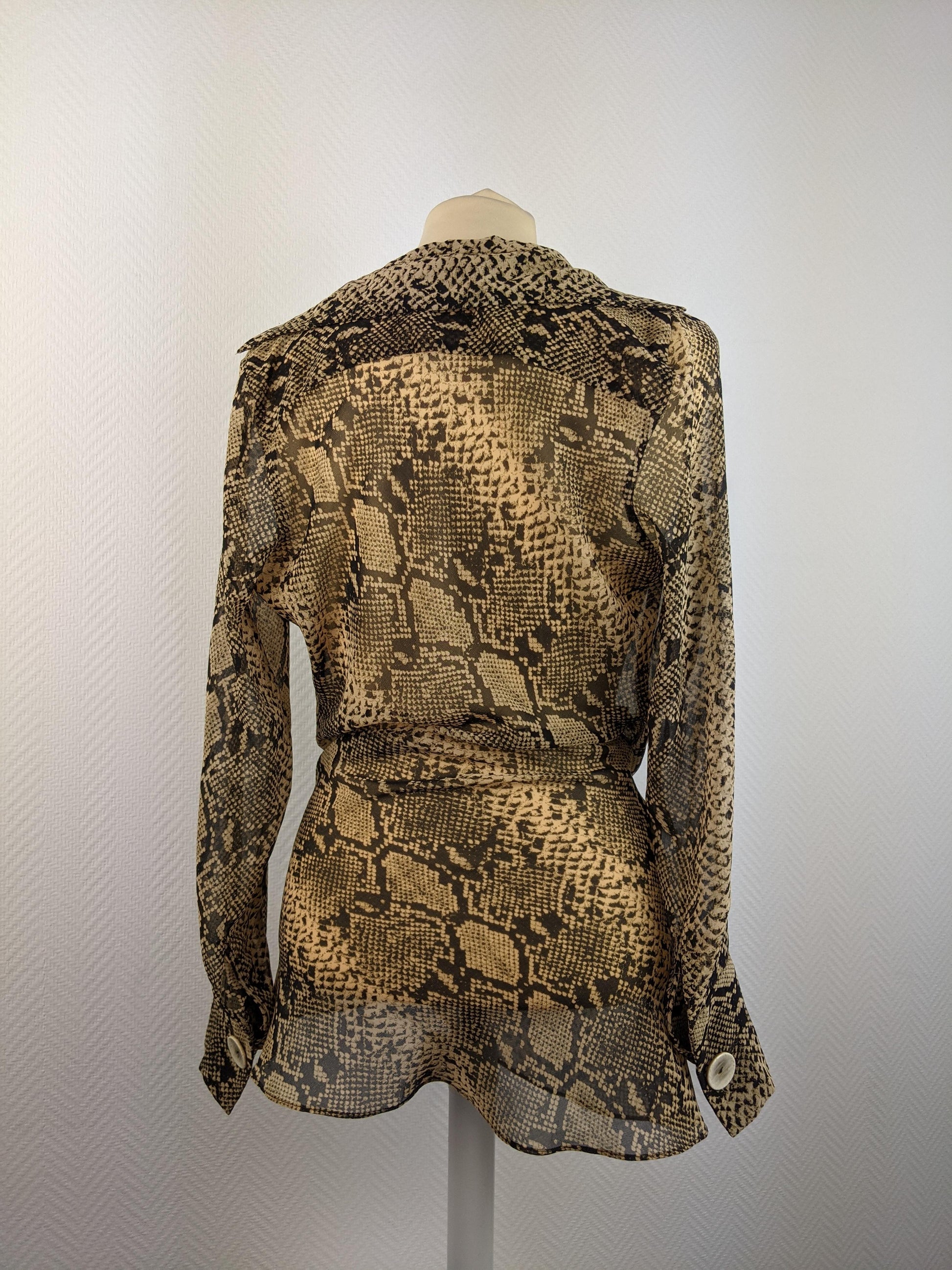 Back view of snake print blouse