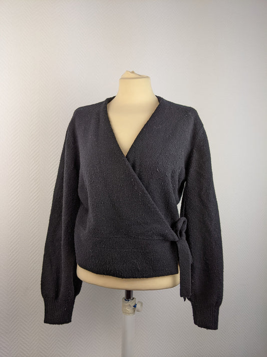 Front view of black wrap cardigan