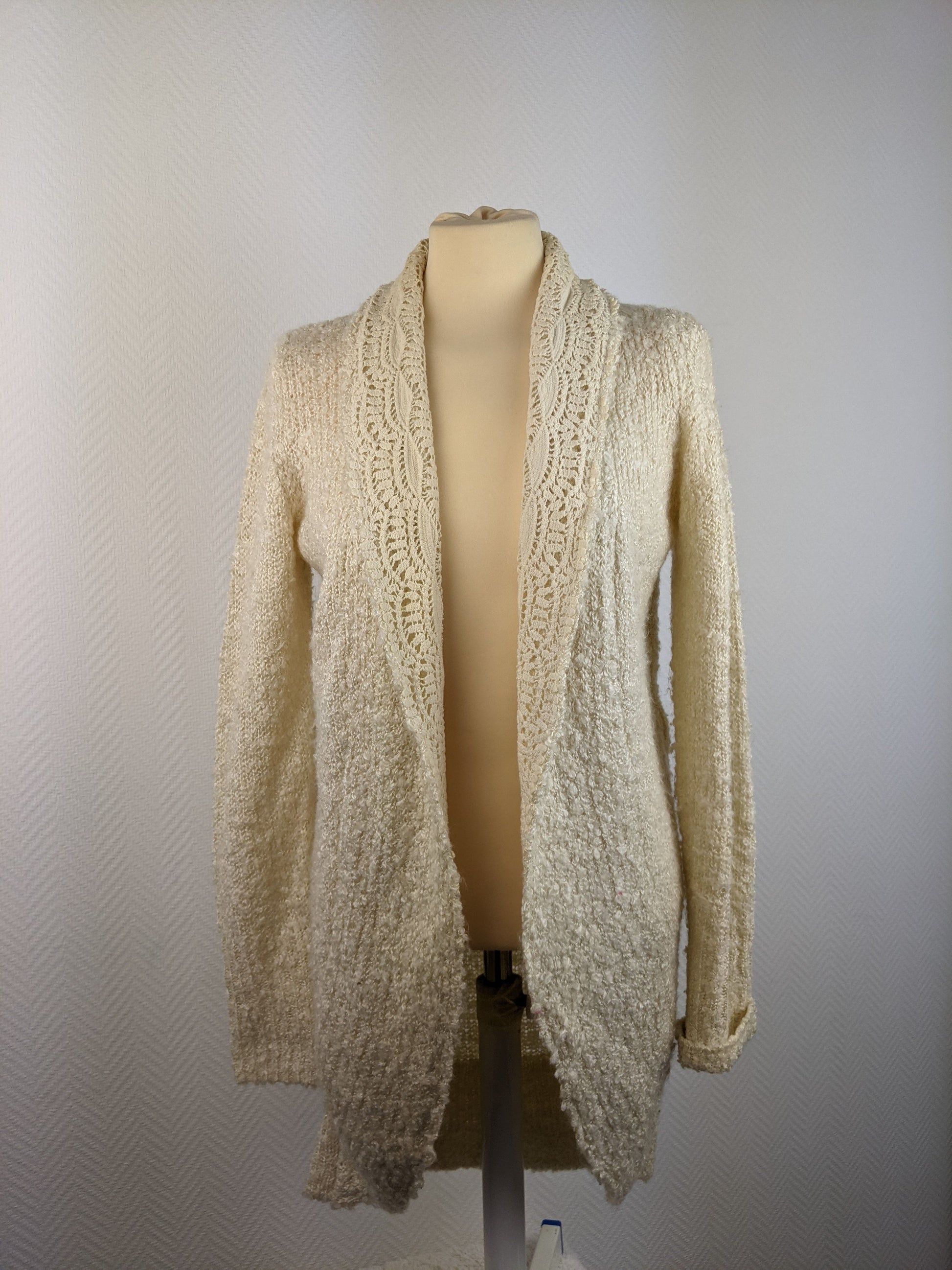 Front view of Cotton Club cream open front cardigan