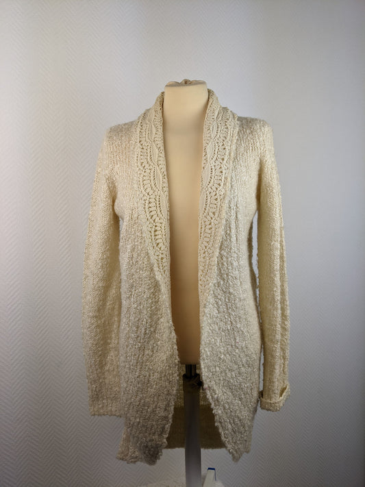 Front view of Cotton Club cream open front cardigan