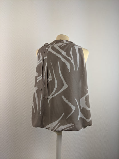 Back view of Assuili gray sleeveless blouse