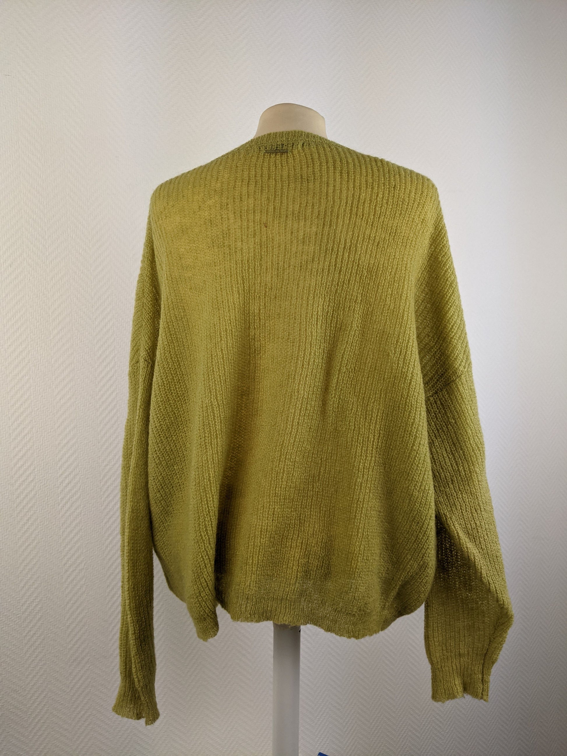 Back view of olive green sweater