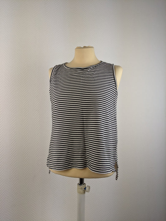 Front view of Vanilia black striped sleeveless top