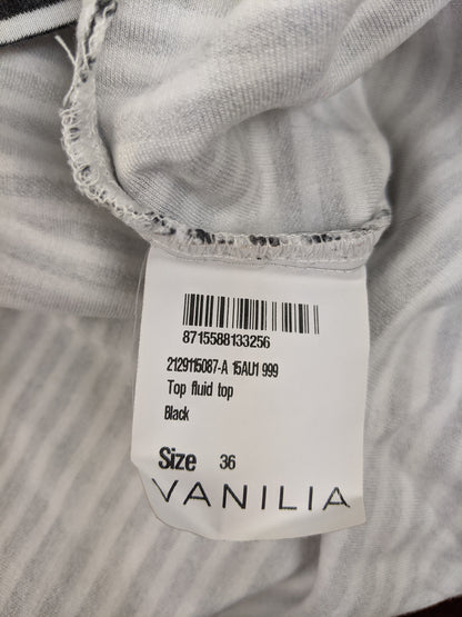 Label showing size and brand of Vanilia top