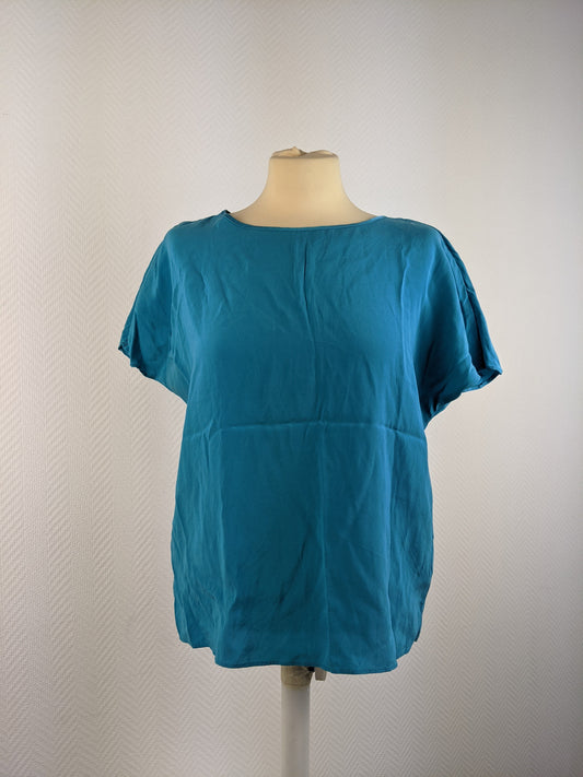 Front view of Vanilia Caribbean Sea Blue Silk Top