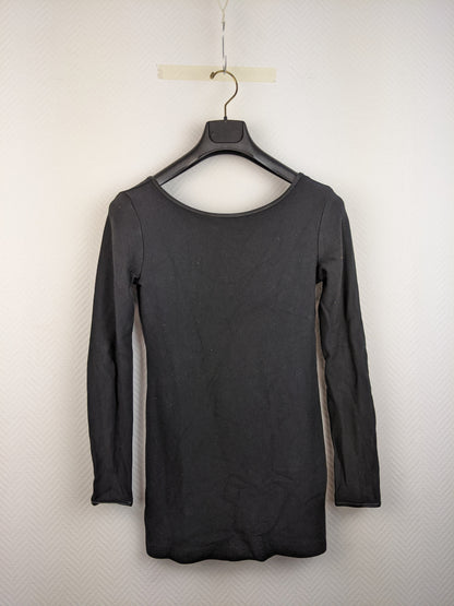 Front view of black long-sleeve top on hanger