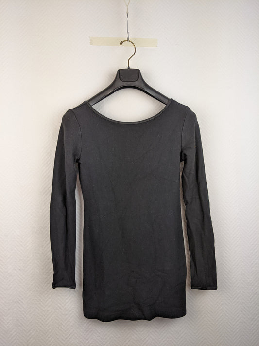 Front view of black long-sleeve top on hanger