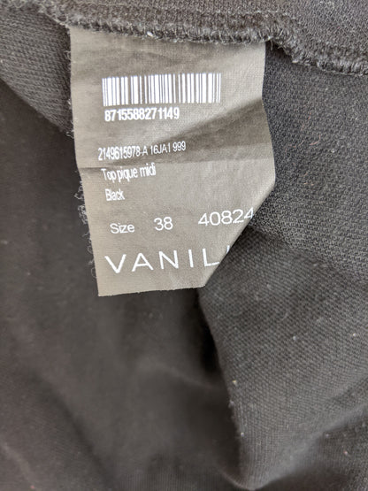 Close-up of clothing tag showing size and details