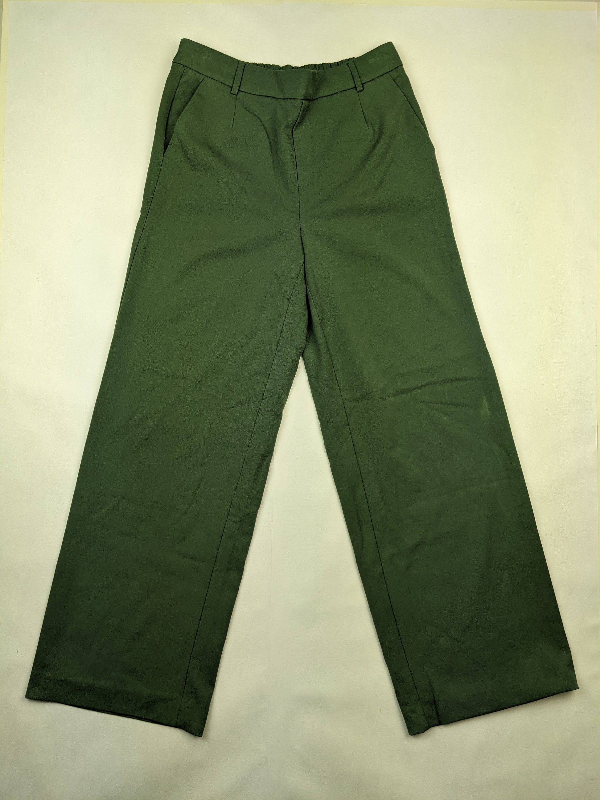 Front view of green straight-leg pants