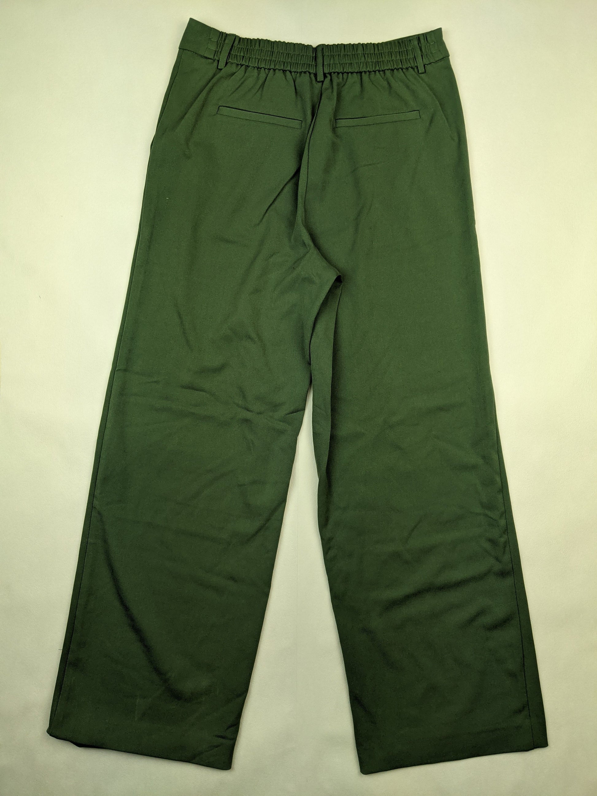 Back view of green straight-leg pants