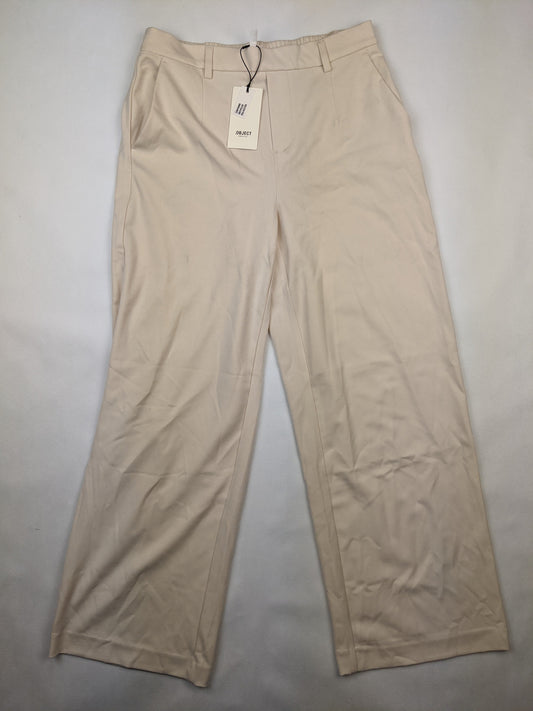 Front view of ivory wide-leg pants