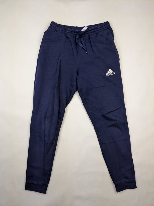 Front view of navy blue Adidas sweatpants