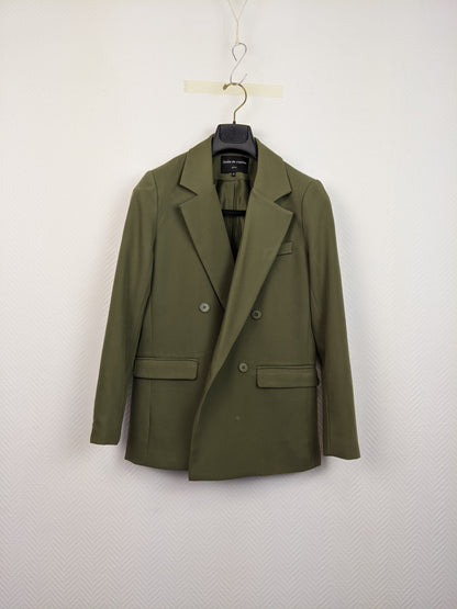 Front view of an olive green blazer on a hanger