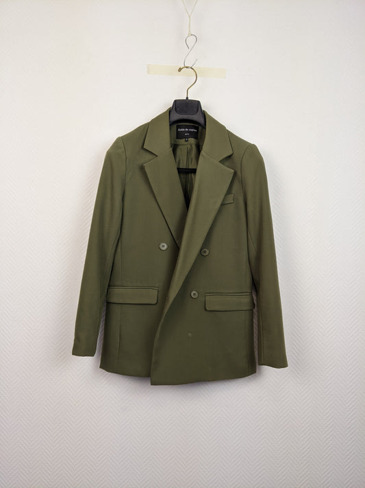 Front view of an olive green blazer on a hanger