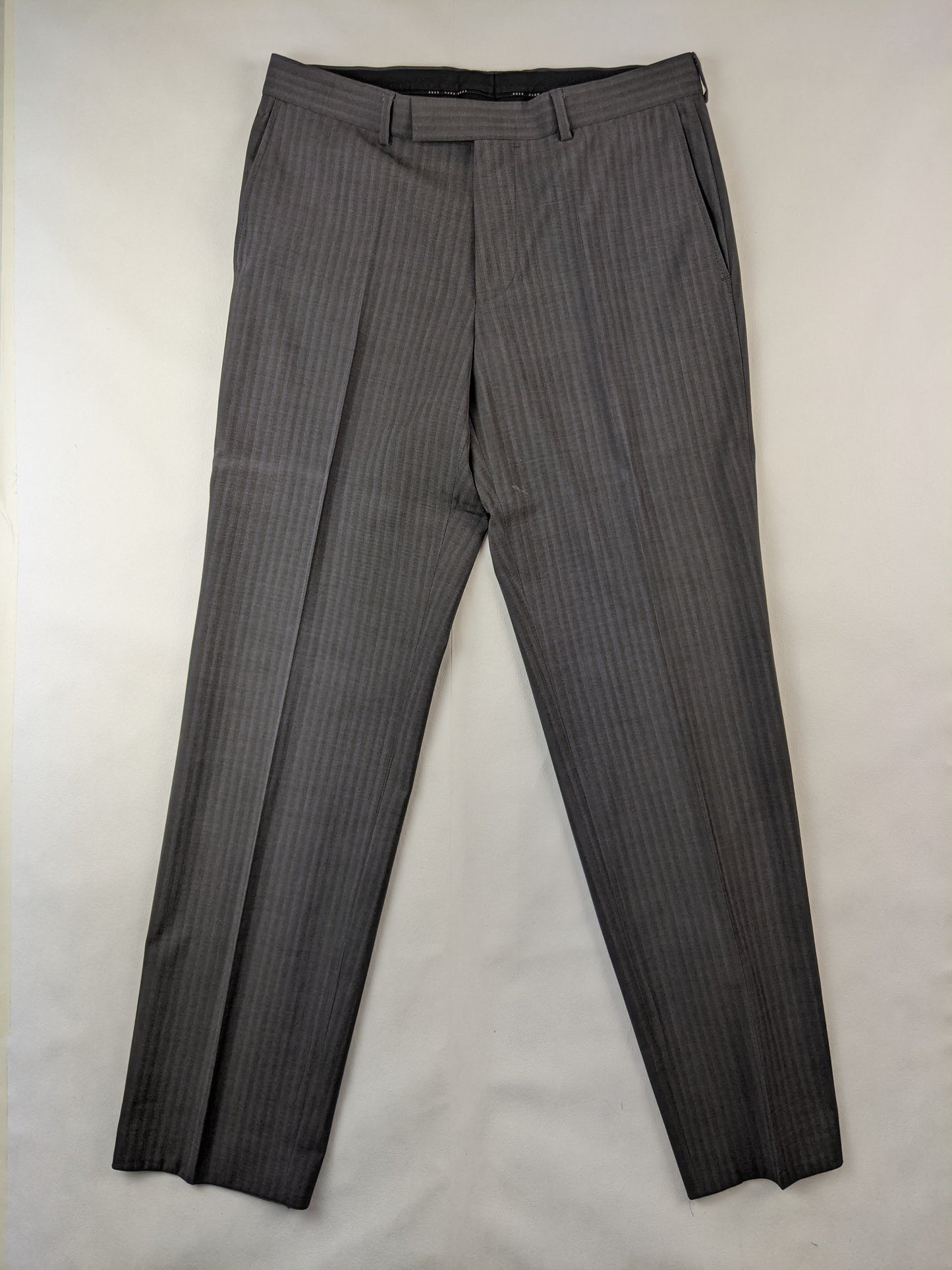 Front view of Hugo Boss pinstripe trousers