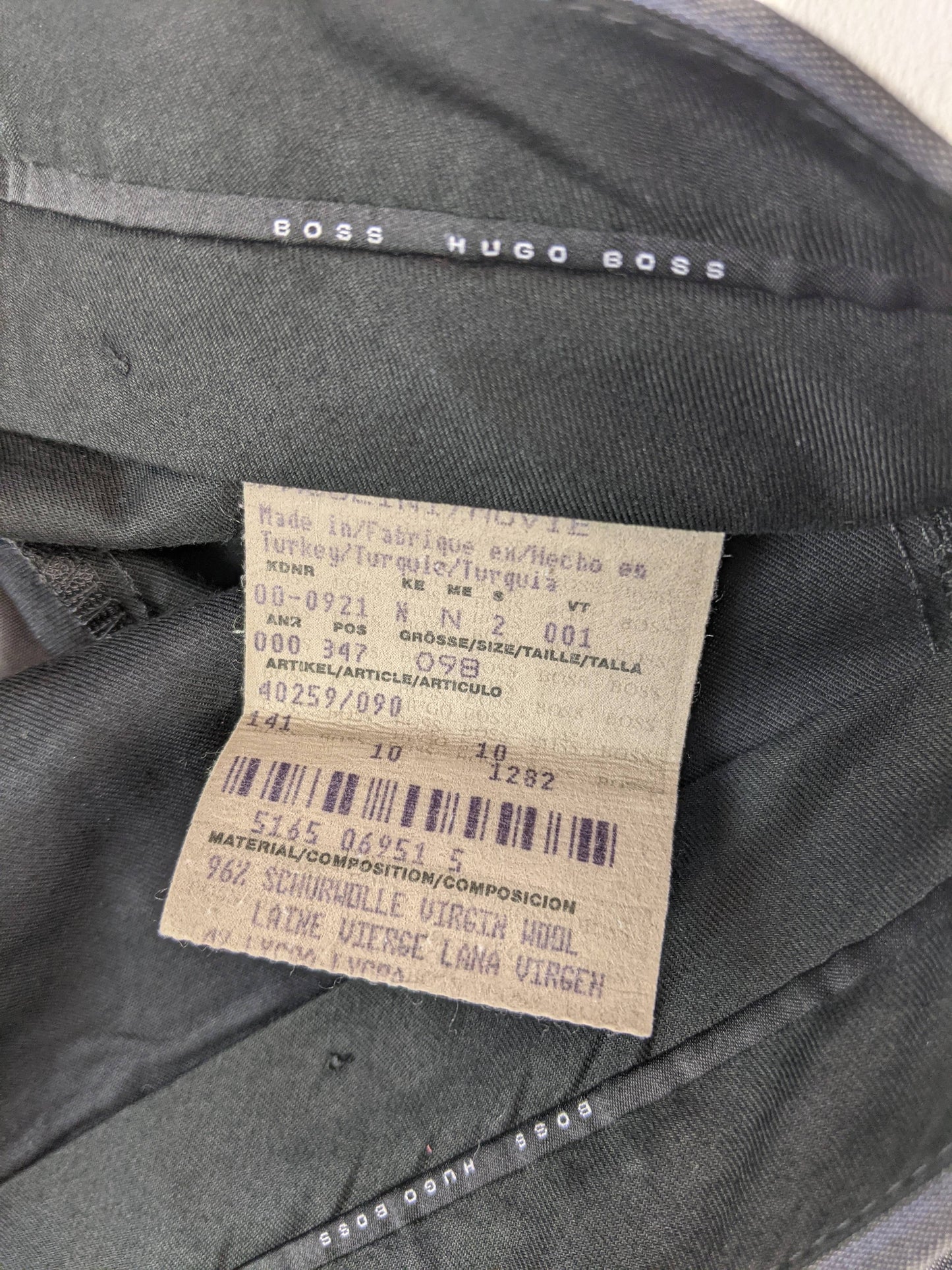 Label showing Hugo Boss branding and material details