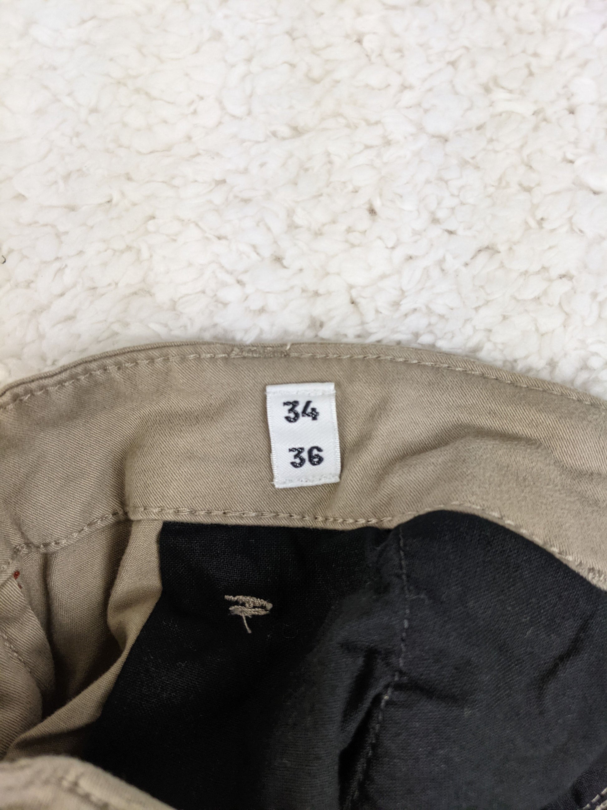 Size label showing 34/36 for Jack & Jones pants