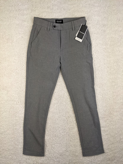 Front view of grey Jack & Jones slim fit pants