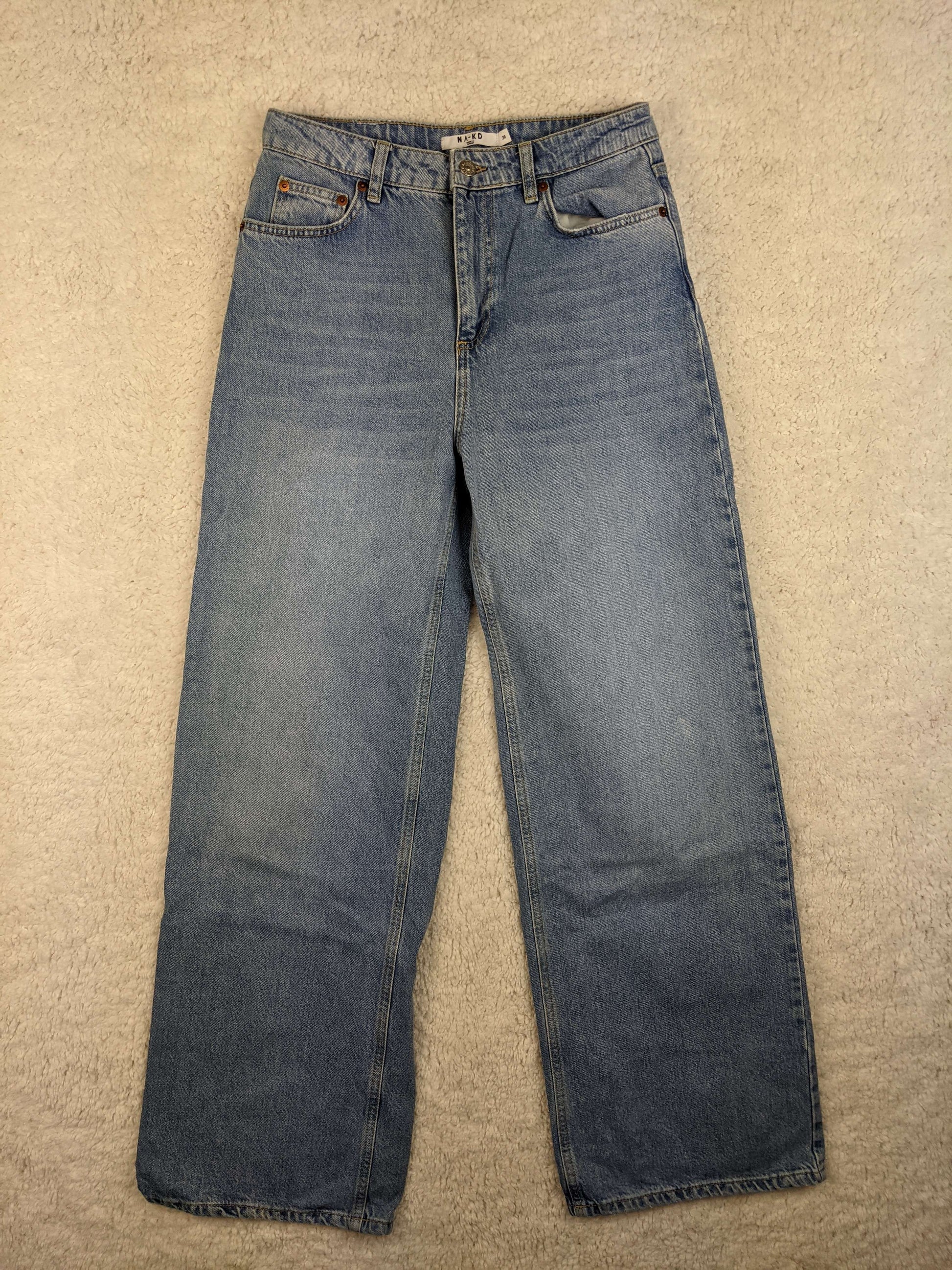 Front view of NA-KD blue jeans