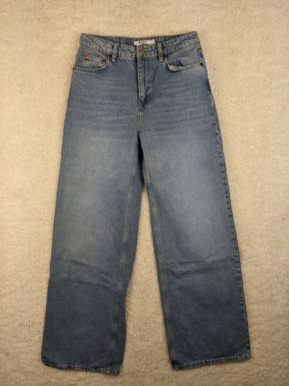 Front view of NA-KD blue jeans