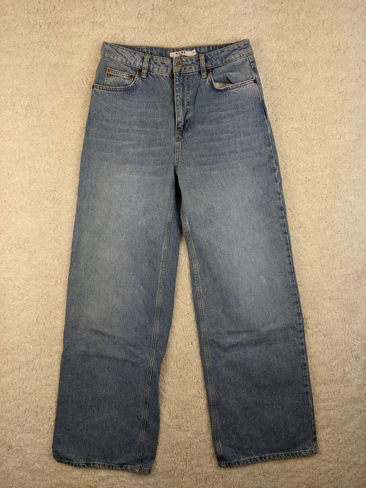 Front view of NA-KD blue jeans
