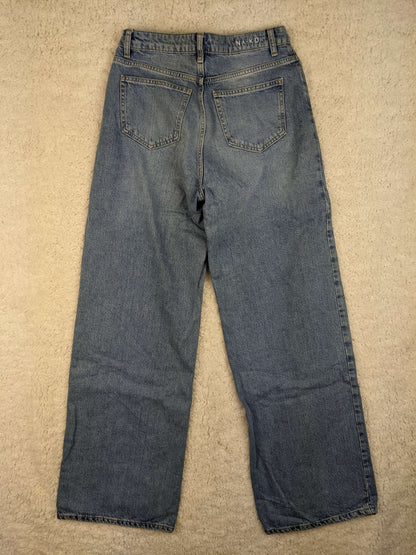 Back view of NA-KD blue jeans