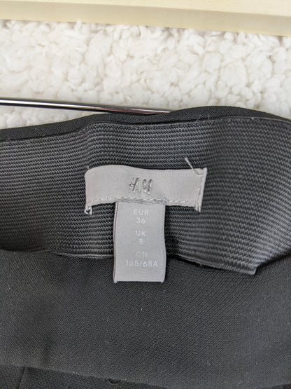 Size label of black shorts showing EUR 36
