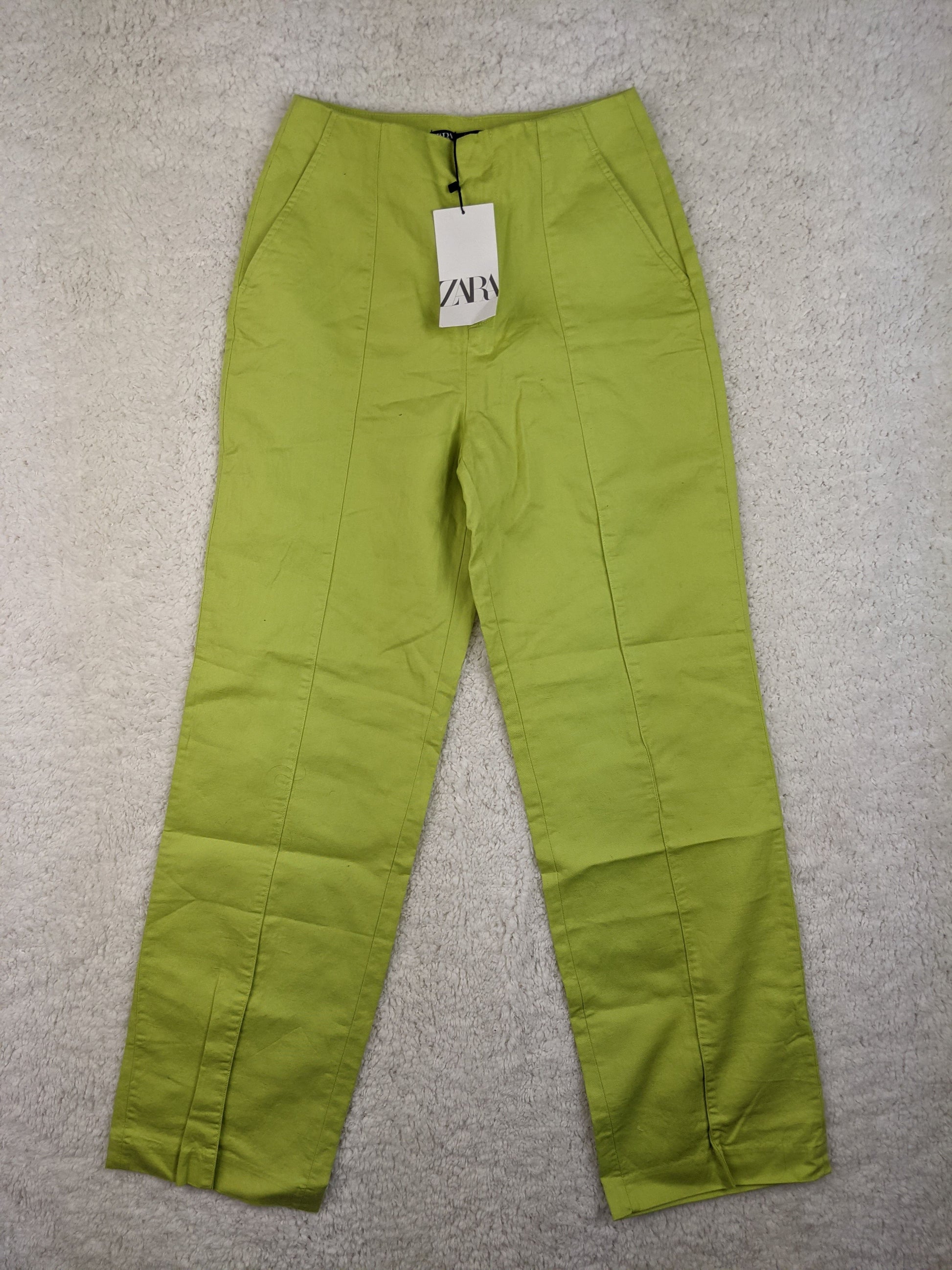 Front view of Zara lime green high-waisted pants