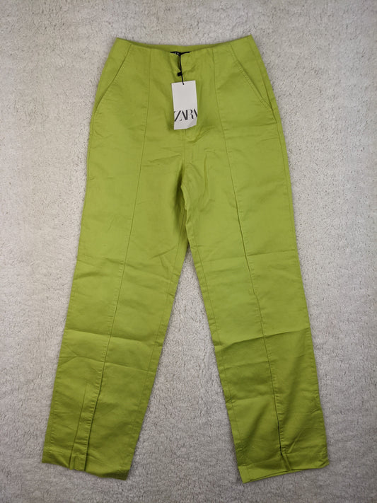 Front view of Zara lime green high-waisted pants