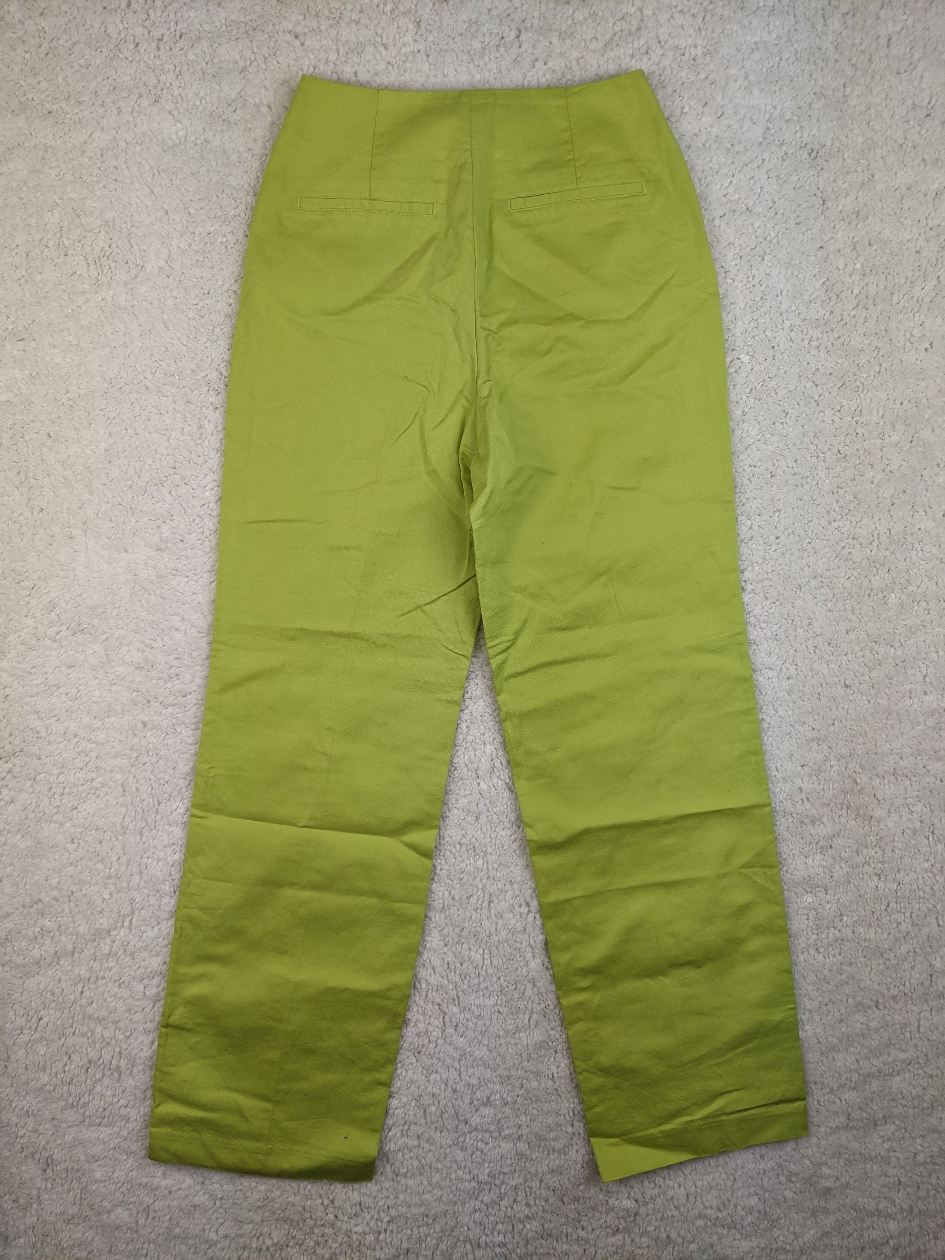 Back view of Zara lime green high-waisted pants
