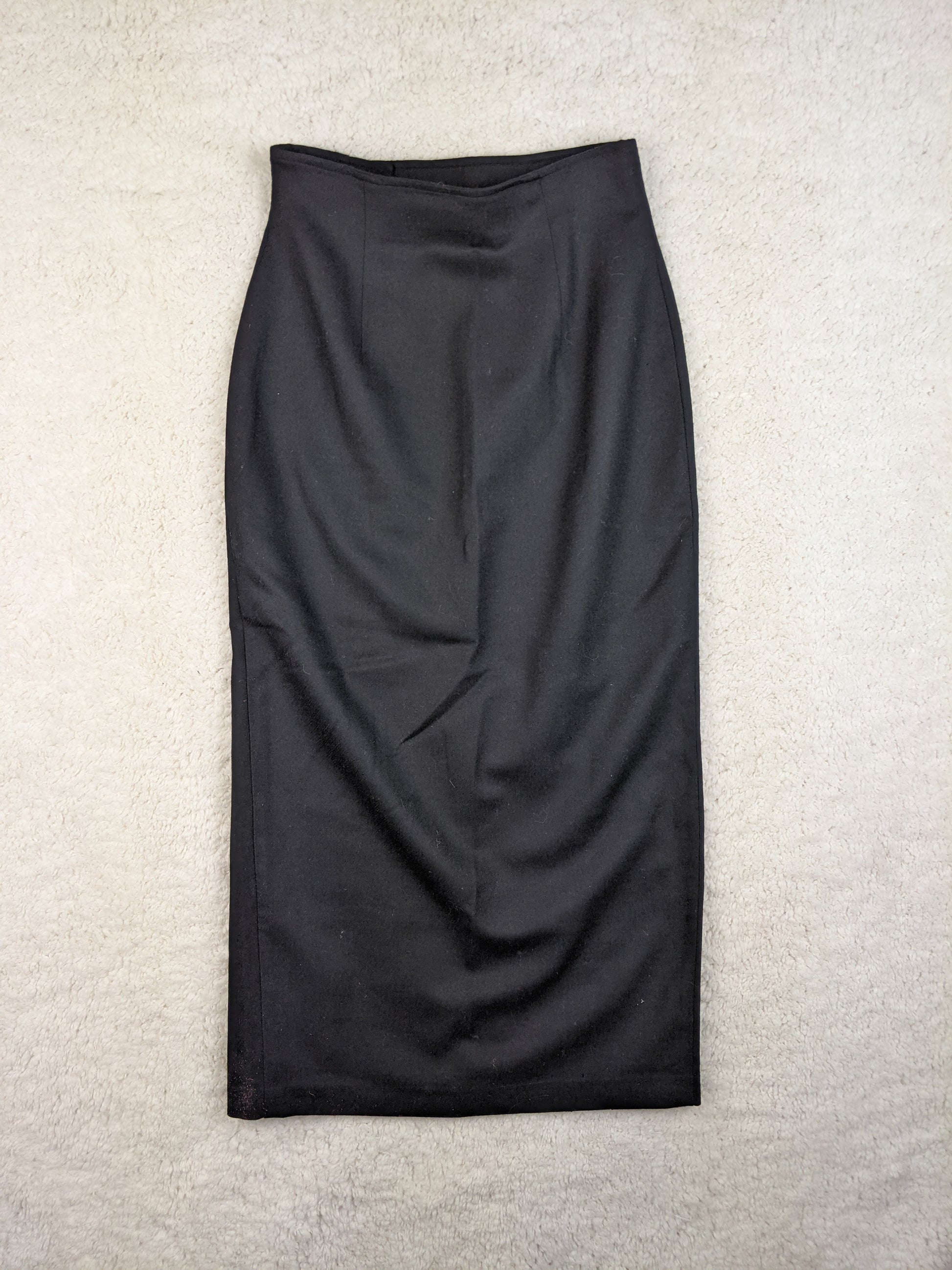 Back view of a black pencil skirt