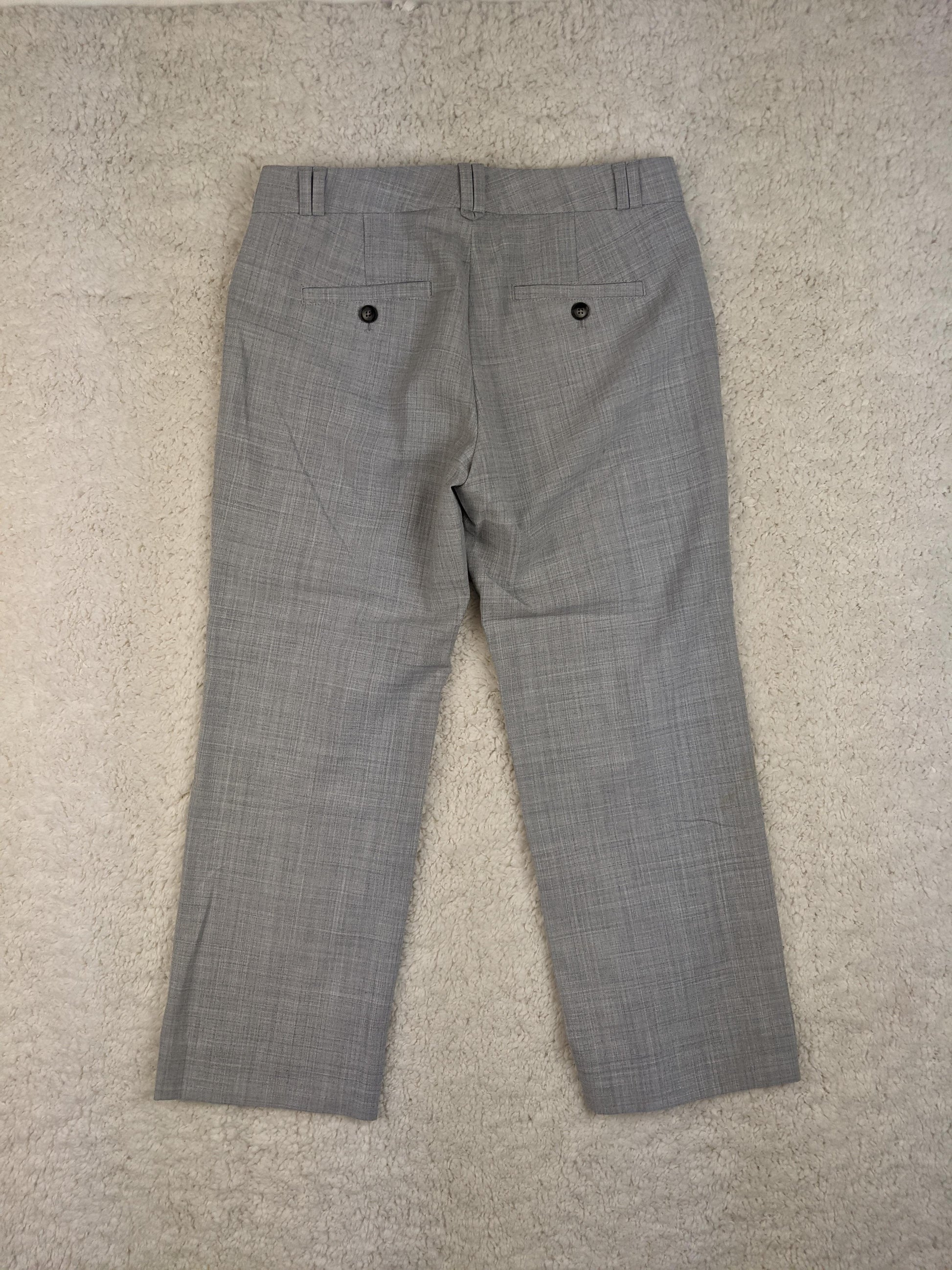 Back view of gray cropped trousers