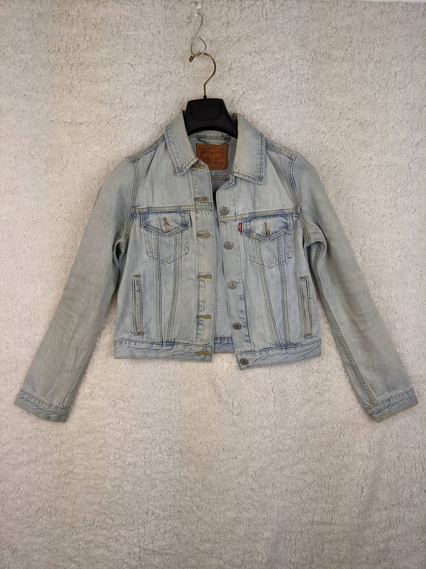 Front view of Levi's light wash denim jacket