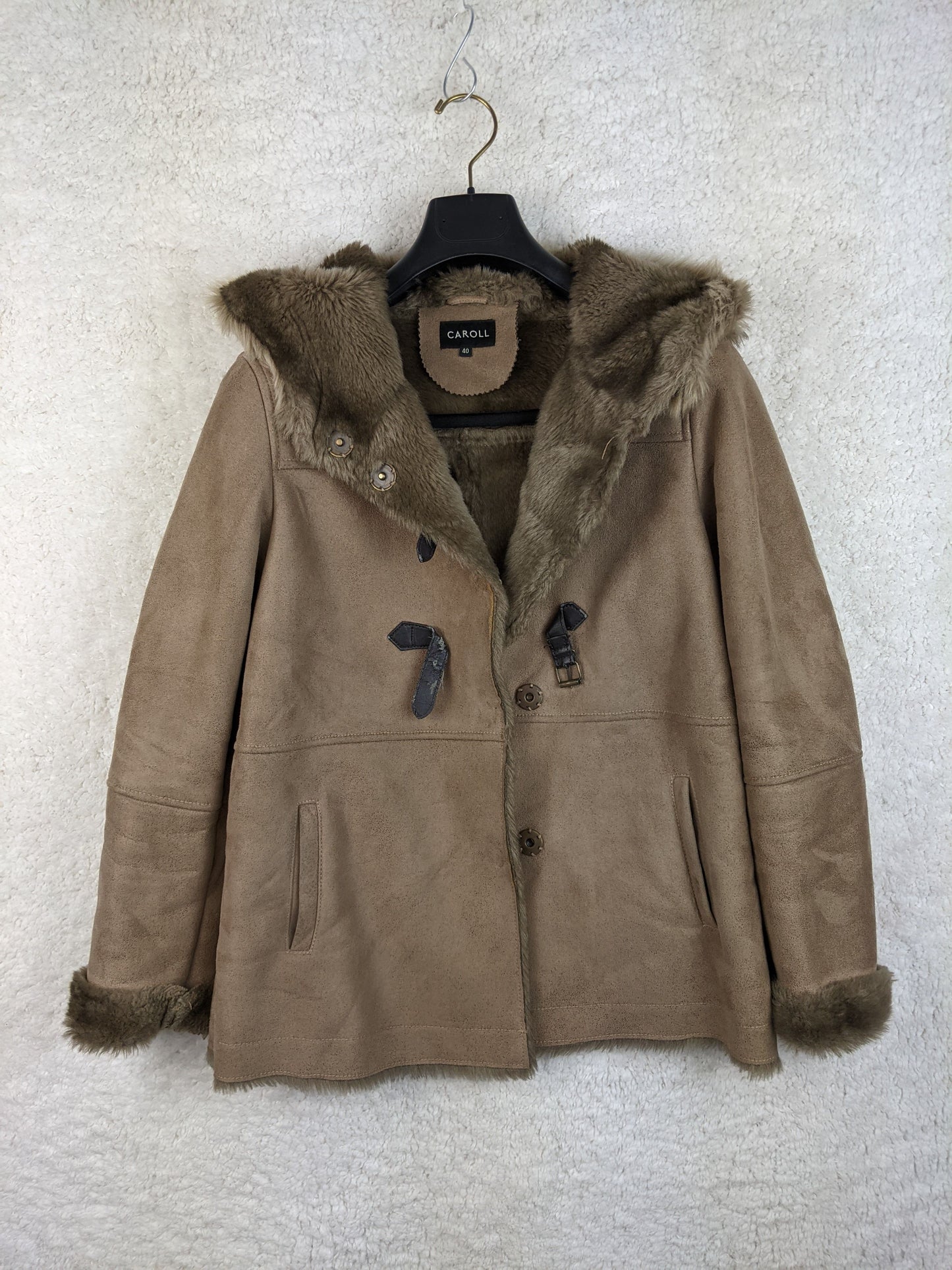 Front view of Caroll brown faux fur-lined jacket
