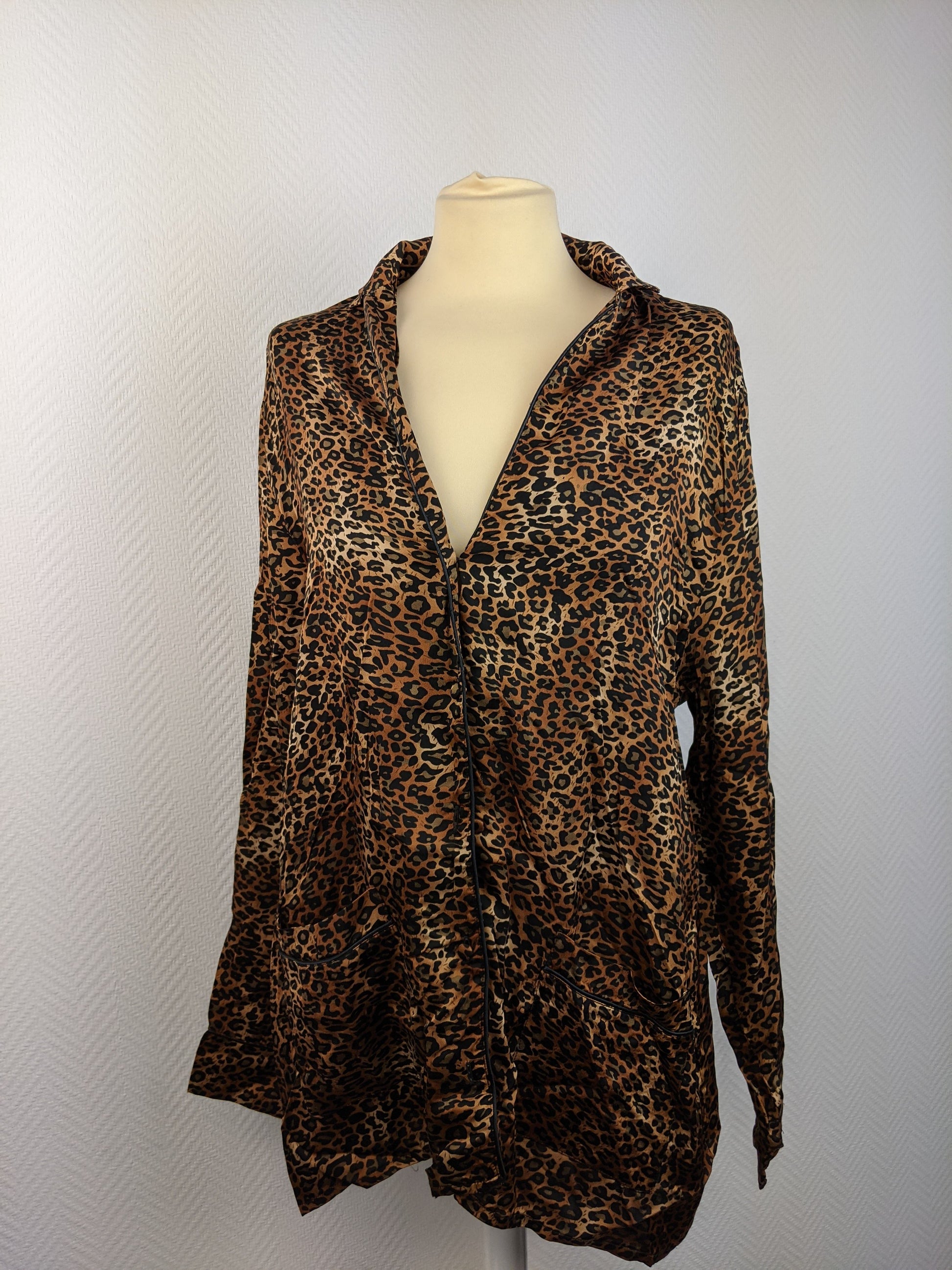 Front view of a leopard print blouse